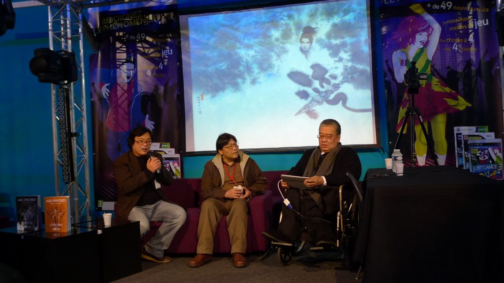 和鄭問、吳坤墉在台上