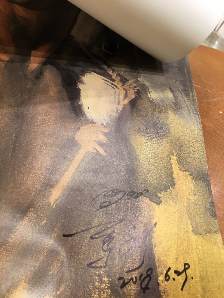 這一位要我簽在海報上，指定要和鄭問的簽名在一起。